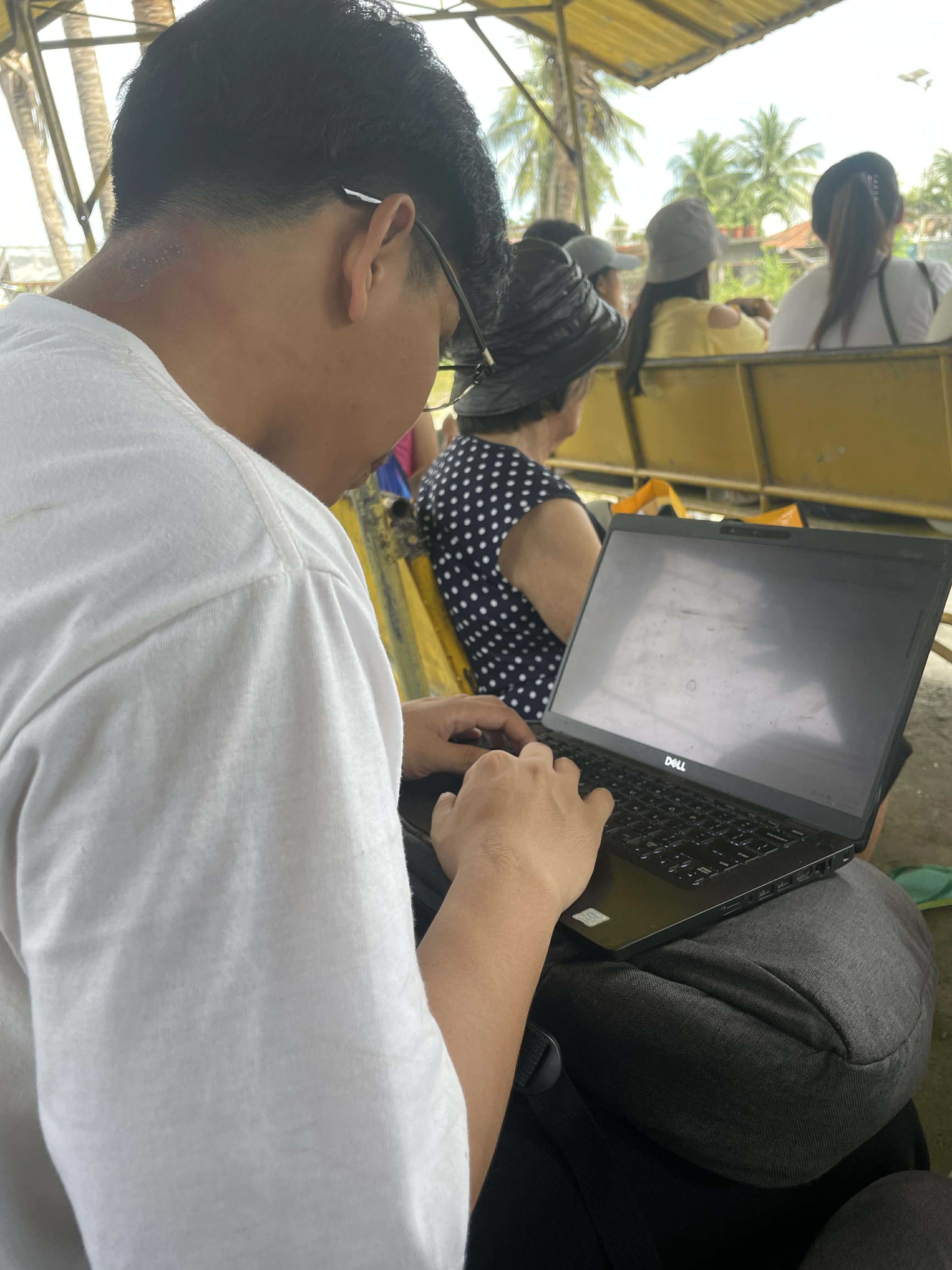 Von working on a laptop while away from his usual workspace